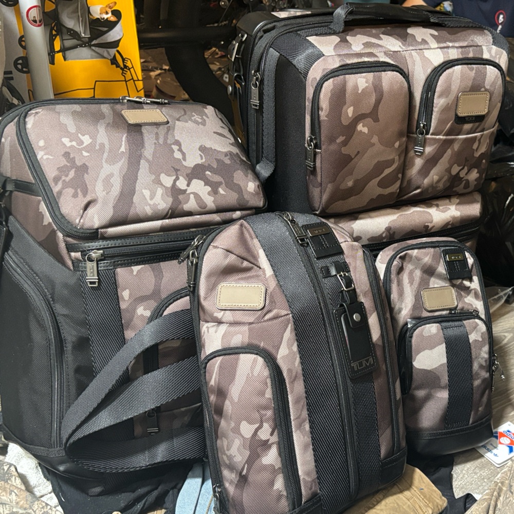 Tumi Brown and Black Camouflage Travel Bag Set